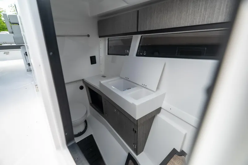Slide: The Image of Modern bathroom interior of 2026 Monterey 385SS Super Sport boat, featuring sleek design and fixtures. - 26