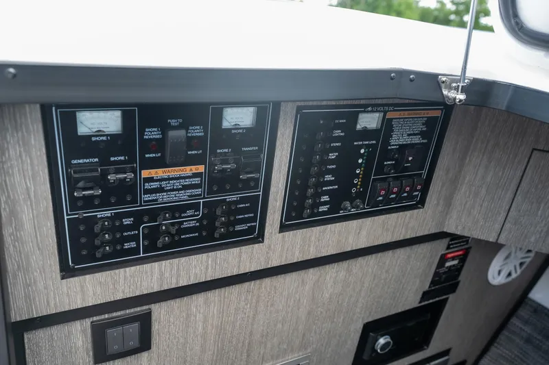 Slide: The Image of Electrical control panel of 2026 Monterey 385SS Super Sport boat interior. - 28