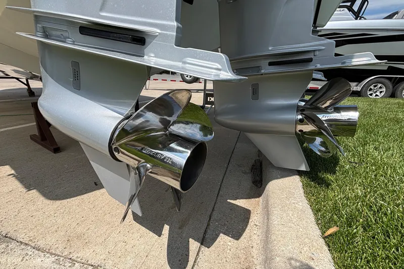 Slide: The Image of Twin propellers of a 2026 Monterey 385SS Super Sport boat on display. - 6