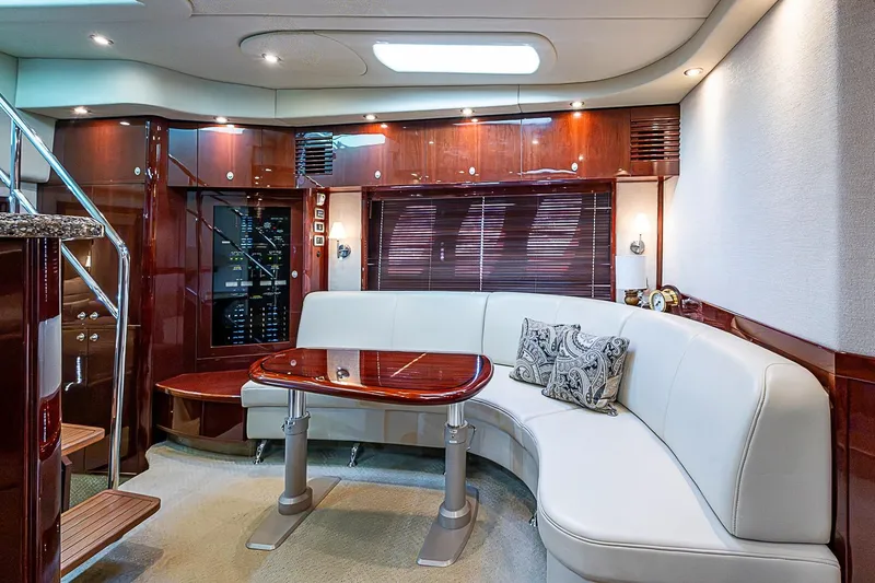 Slide: The Image of Luxurious interior of 2008 Sea Ray 60 Sundancer yacht with elegant seating and wooden finishes. - 34