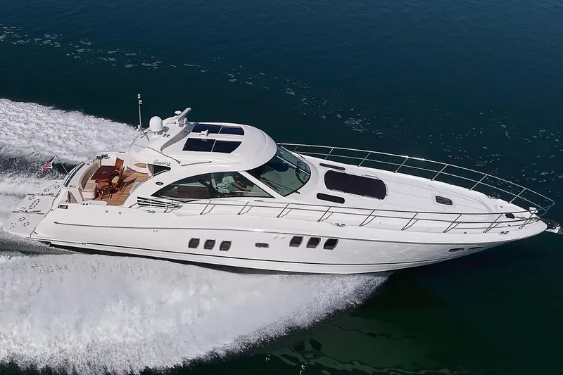 Slide: The Image of Luxury 2008 Sea Ray 60 Sundancer yacht cruising on open water. - 14