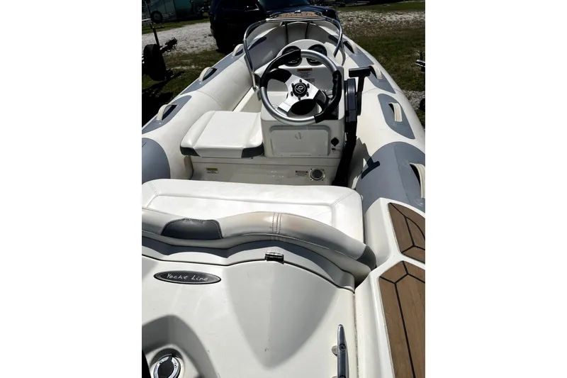 Slide: The Image of Interior view of a 2008 Sea Ray 60 Sundancer yacht with steering wheel and seating. - 75