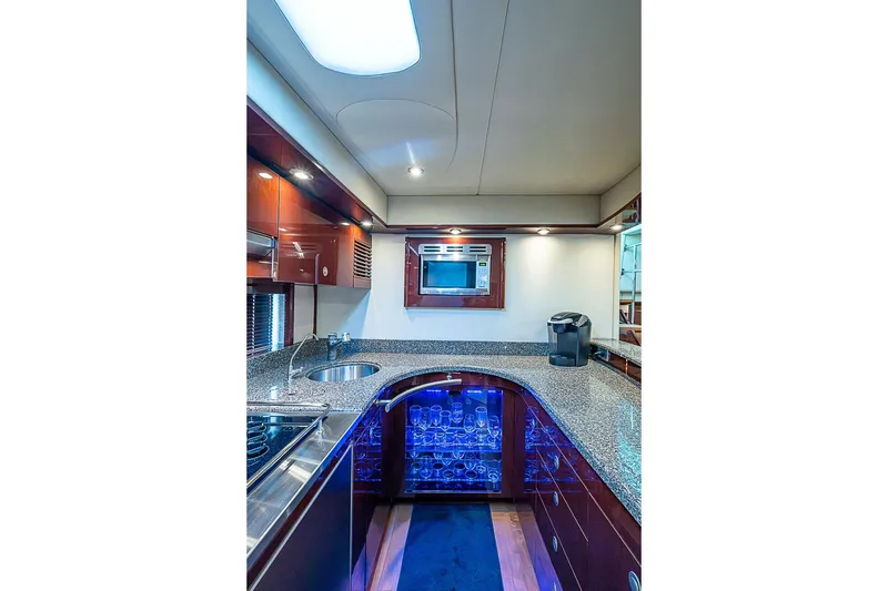 Slide: The Image of Luxurious 2008 Sea Ray 60 Sundancer yacht kitchen with modern appliances and elegant design. - 37
