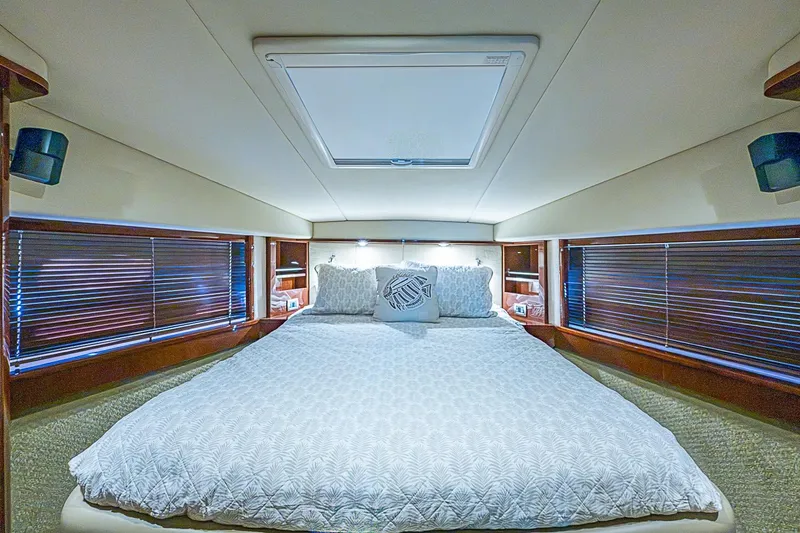 Slide: The Image of Luxurious bedroom interior of 2008 Sea Ray 60 Sundancer yacht with elegant bedding. - 47
