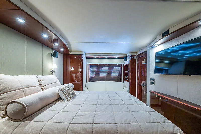 Slide: The Image of Luxurious bedroom interior of 2008 Sea Ray 60 Sundancer yacht with modern amenities. - 42
