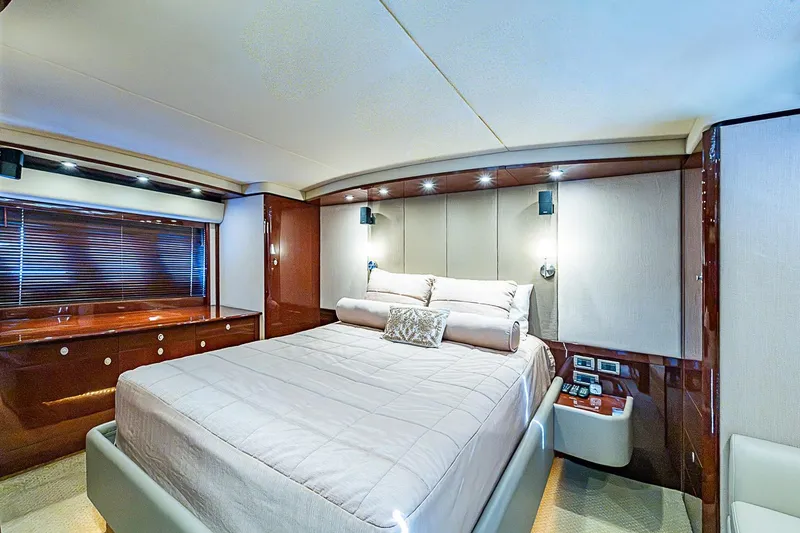 Slide: The Image of Luxurious bedroom interior of 2008 Sea Ray 60 Sundancer yacht with elegant furnishings. - 38
