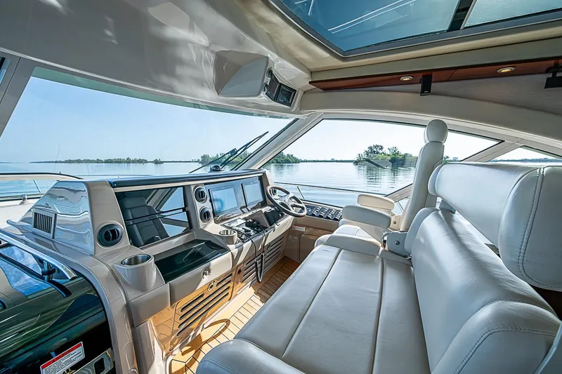 Slide: The Image of Luxurious interior of 2008 Sea Ray 60 Sundancer yacht with panoramic water views. - 17
