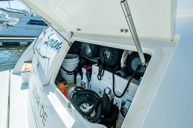 Slide: The Image of Storage compartment of a 2008 Sea Ray 60 Sundancer yacht, featuring ropes and equipment. - 73