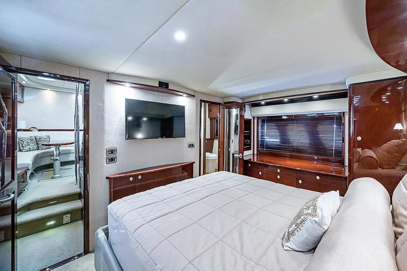 Slide: The Image of Luxurious interior of 2008 Sea Ray 60 Sundancer yacht with elegant bedroom and modern amenities. - 39