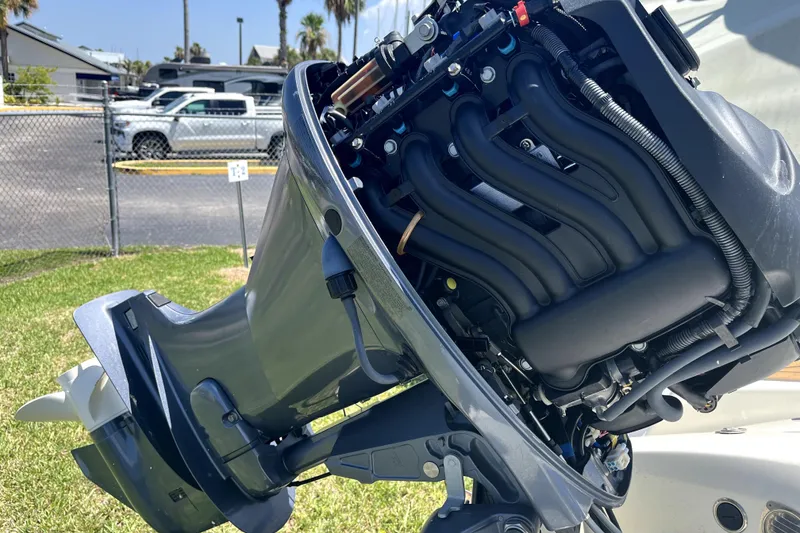 Slide: The Image of Outboard motor of a 2008 Sea Ray 60 Sundancer on display outdoors. - 78