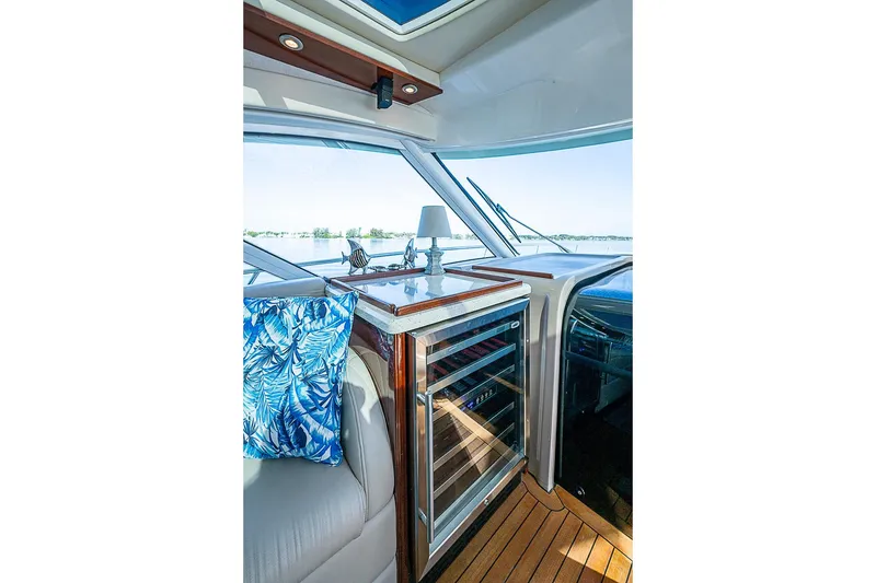 Slide: The Image of Interior of 2008 Sea Ray 60 Sundancer yacht with wine cooler and scenic view. - 29