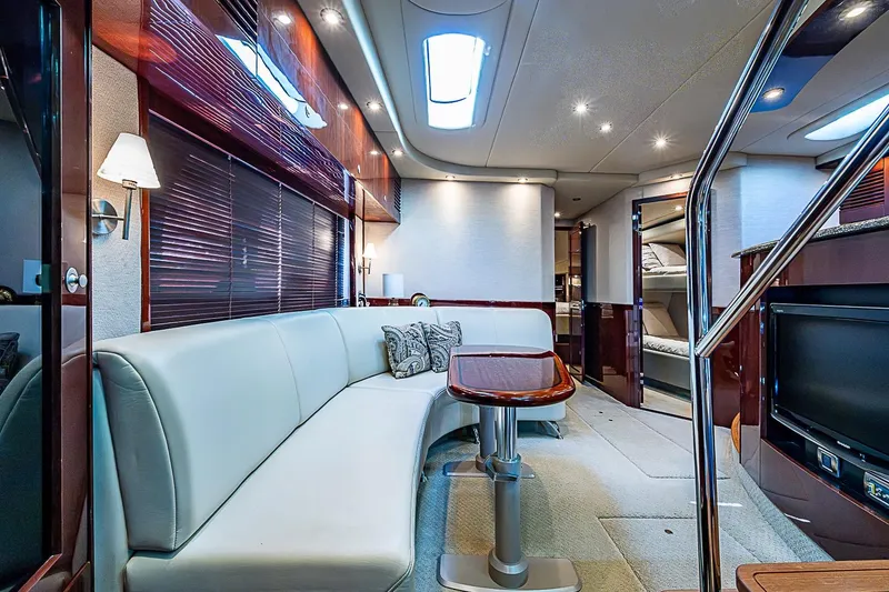 Slide: The Image of Luxurious interior of 2008 Sea Ray 60 Sundancer yacht with elegant seating and modern amenities. - 33