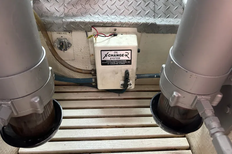 Slide: The Image of Engine room of 1995 Ocean 48 Cockpit Motor Yacht with oil exchanger system. - 50