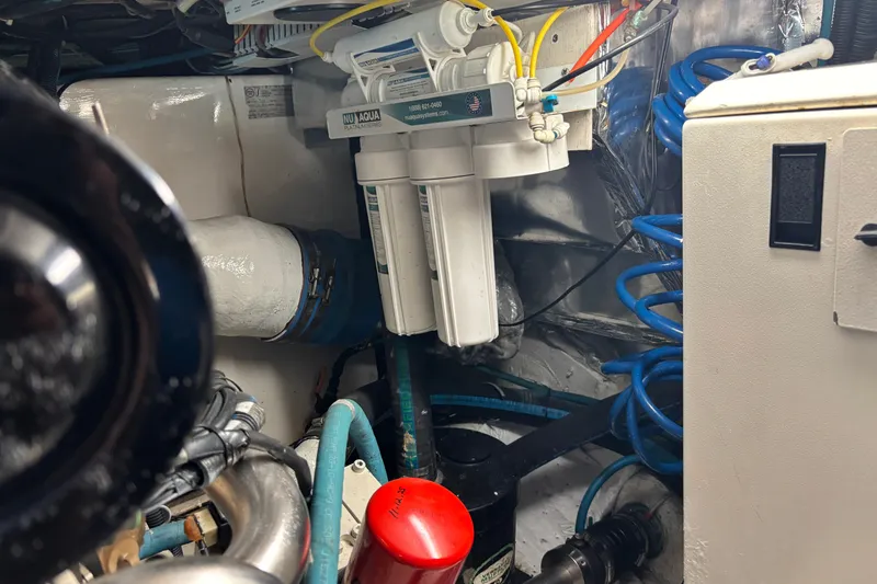 Slide: The Image of Engine room of a 1995 Ocean 48 Cockpit Motor Yacht with filtration system. - 49
