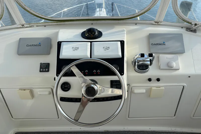 Slide: The Image of Cockpit of 1995 Ocean 48 Cockpit Motor Yacht with Garmin navigation system. - 42