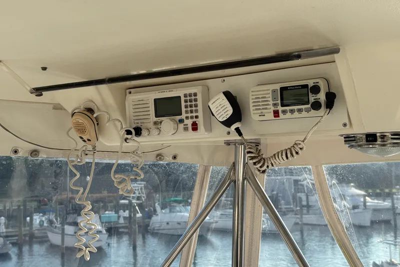 Slide: The Image of Interior view of 1995 Ocean 48 Cockpit Motor Yacht with communication equipment. - 43