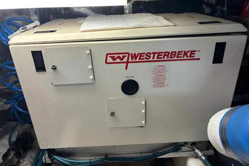Slide: The Image of Westerbeke generator in 1995 Ocean 48 Cockpit Motor Yacht engine room. - 48