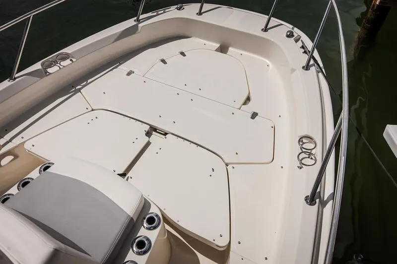 Slide: The Image of Manufacturer Provided Image: 2014 Boston Whaler 210 Dauntless boat deck with storage compartments. - 30