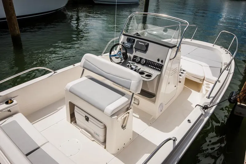 Slide: The Image of Manufacturer Provided Image: 2014 Boston Whaler 210 Dauntless boat interior with helm and seating. - 31
