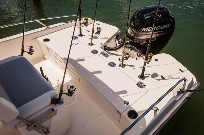Slide: The Image of Manufacturer Provided Image: 2014 Boston Whaler 210 Dauntless fishing boat with Mercury engine and rod holders. - 33