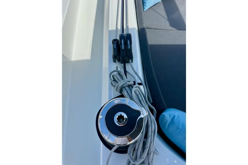 Slide: The Image of Close-up of Jeanneau Sun Odyssey 410 sailboat winch and ropes, 2024 model. - 20