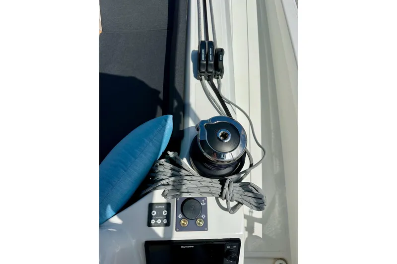 Slide: The Image of Close-up of Jeanneau Sun Odyssey 410 sailboat winch and control panel, 2024 model. - 29