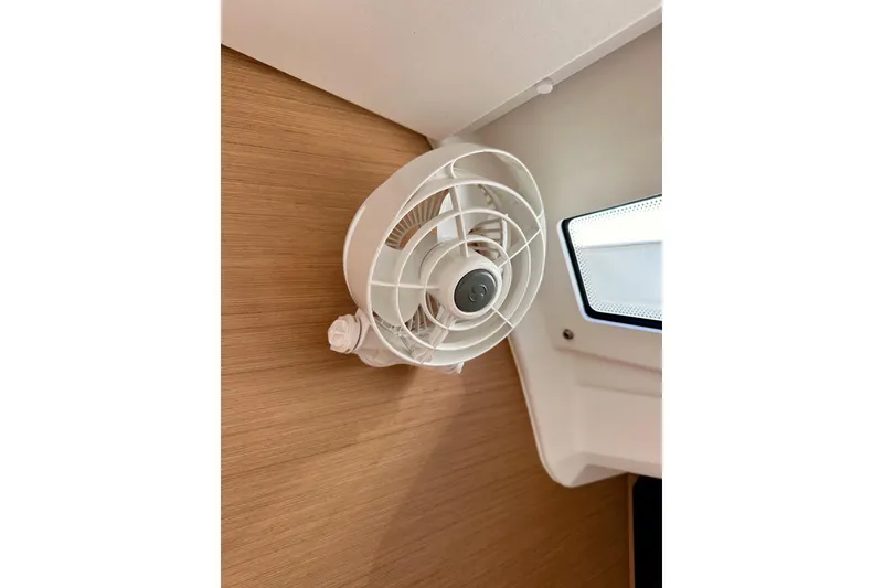 Slide: The Image of Wall-mounted fan inside 2024 Jeanneau Sun Odyssey 410 yacht cabin. - 54