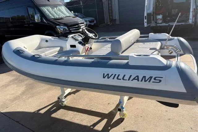 Slide: The Image of 2018 Williams 345 Sports Jet boat on display, featuring sleek design and modern features. - 4