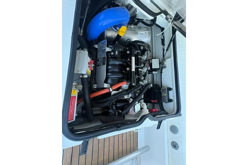 Slide: The Image of Engine compartment of a 2018 Williams 345 Sports Jet, showcasing detailed components and wiring. - 5