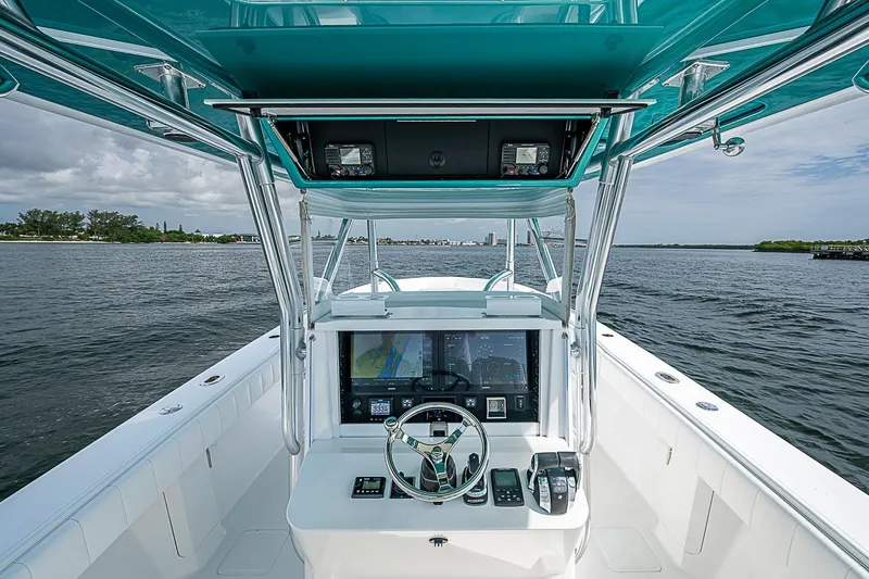 Slide: The Image of Center console of a 2020 Bahama 41 boat with advanced navigation system. - 11