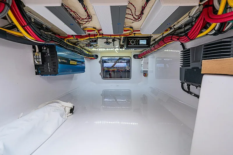 Slide: The Image of Electrical system setup in a 2020 Bahama 41 boat, featuring wiring and power components. - 16