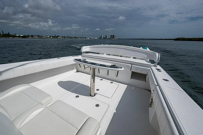 Slide: The Image of 2020 Bahama 41 boat interior with sleek seating and ocean view. - 23