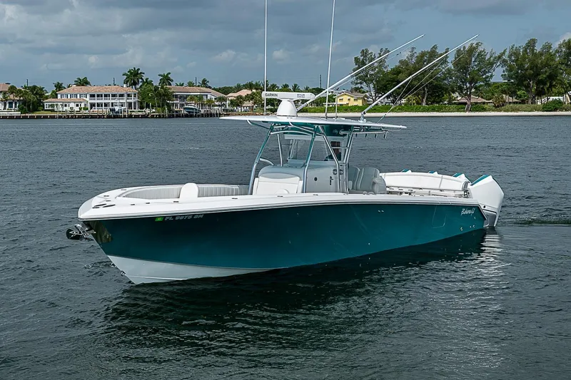 Slide: The Image of 2020 Bahama 41 boat on water, featuring sleek design and modern amenities. - 26