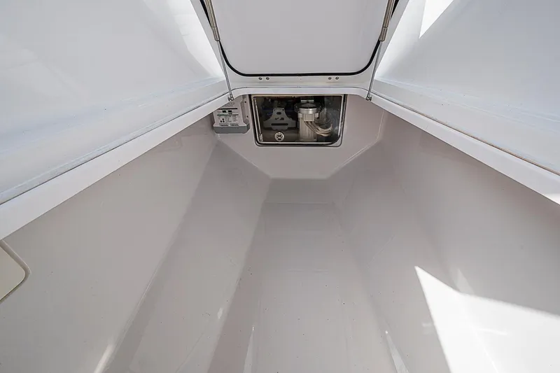 Slide: The Image of Interior storage compartment of 2020 Bahama 41 boat, featuring clean, spacious design. - 6
