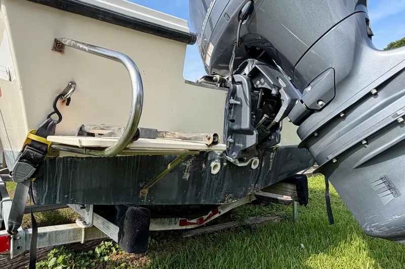 Slide: The Image of 2007 Parker 1801 Center Console boat engine and stern on trailer. - 5