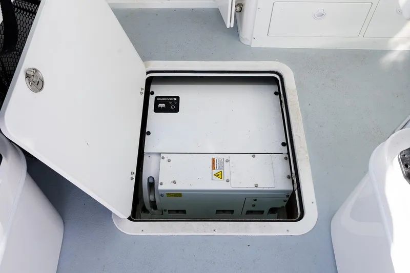 Slide: The Image of 2024 Steiger Craft 31 Fisherman boat compartment with generator. - 20