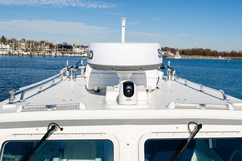 Slide: The Image of 2024 Steiger Craft 31 Fisherman boat on water, featuring advanced navigation equipment. - 41