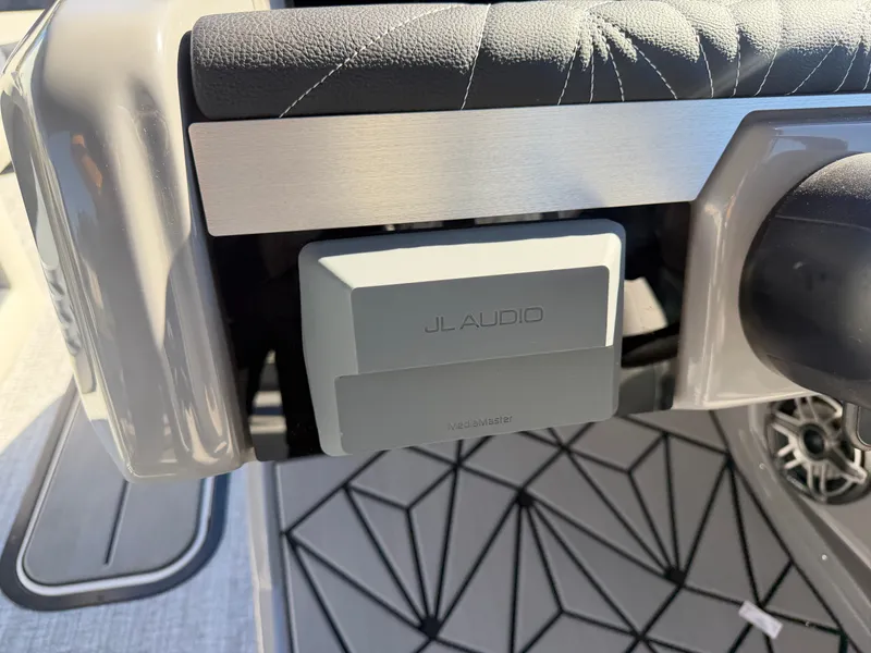 Slide: The Image of Close-up of a JL Audio speaker on a boat with modern design. - 16