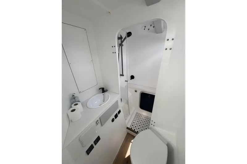 Slide: The Image of Modern bathroom in 2023 Schionning Arrow 1280S yacht, featuring sleek fixtures and minimalist design. - 26