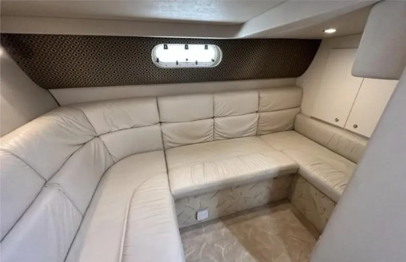 Slide: The Image of Luxurious interior of 2003 Formula 37 PC yacht with plush beige seating. - 22