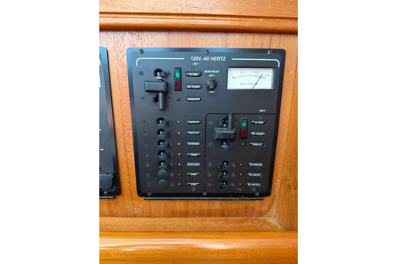 Slide: The Image of Electrical control panel on a 2007 Hunter 41 Deck Salon yacht. - 23