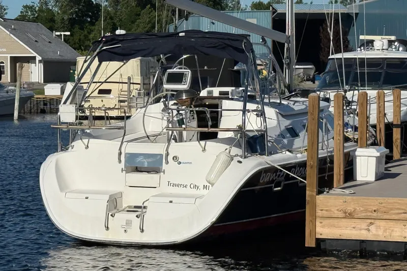 Slide: The Image of Hunter 41 Deck Salon 2007 sailboat docked in Traverse City marina. - 5