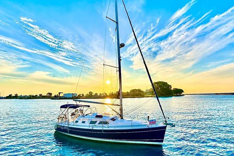 The Image of Sailboat Hunter 41 Deck Salon 2007 on serene water at sunset. - 0