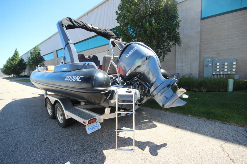 Slide: The Image of 2021 Zodiac Medline 7.5 boat on trailer with Yamaha outboard motor. - 8
