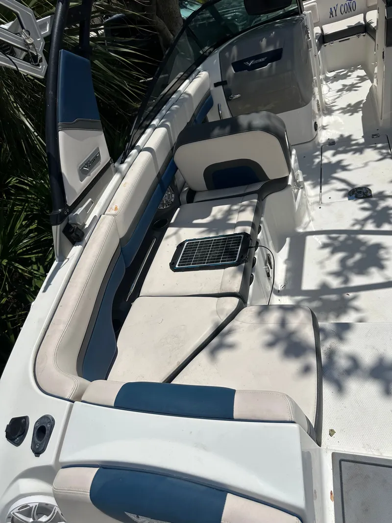 Slide: The Image of 2017 Chaparral 243VRX with spacious cockpit and blue upholstery. - 12