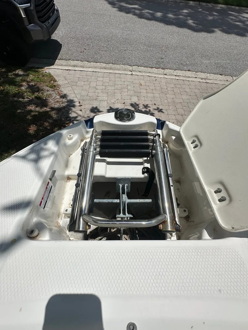 Slide: The Image of Bow area of a boat with anchor and storage compartment. - 16