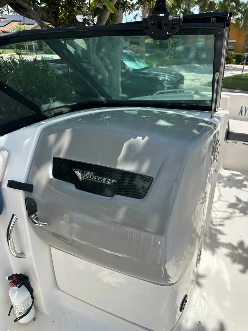 Slide: The Image of The image shows the cockpit of a 2017 Chaparral 243VRX with a Vortex logo. - 20