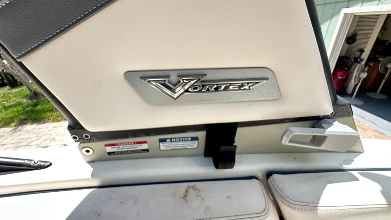 Slide: The Image of Close-up of a Chaparral 243VRX boat part with Vortex logo. - 33