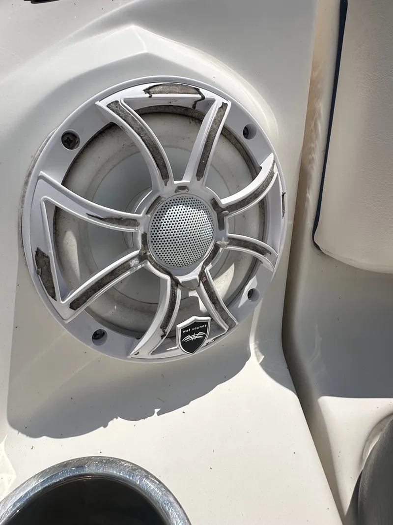 Slide: The Image of Close-up of a speaker on a boat, surrounded by white casing. - 39