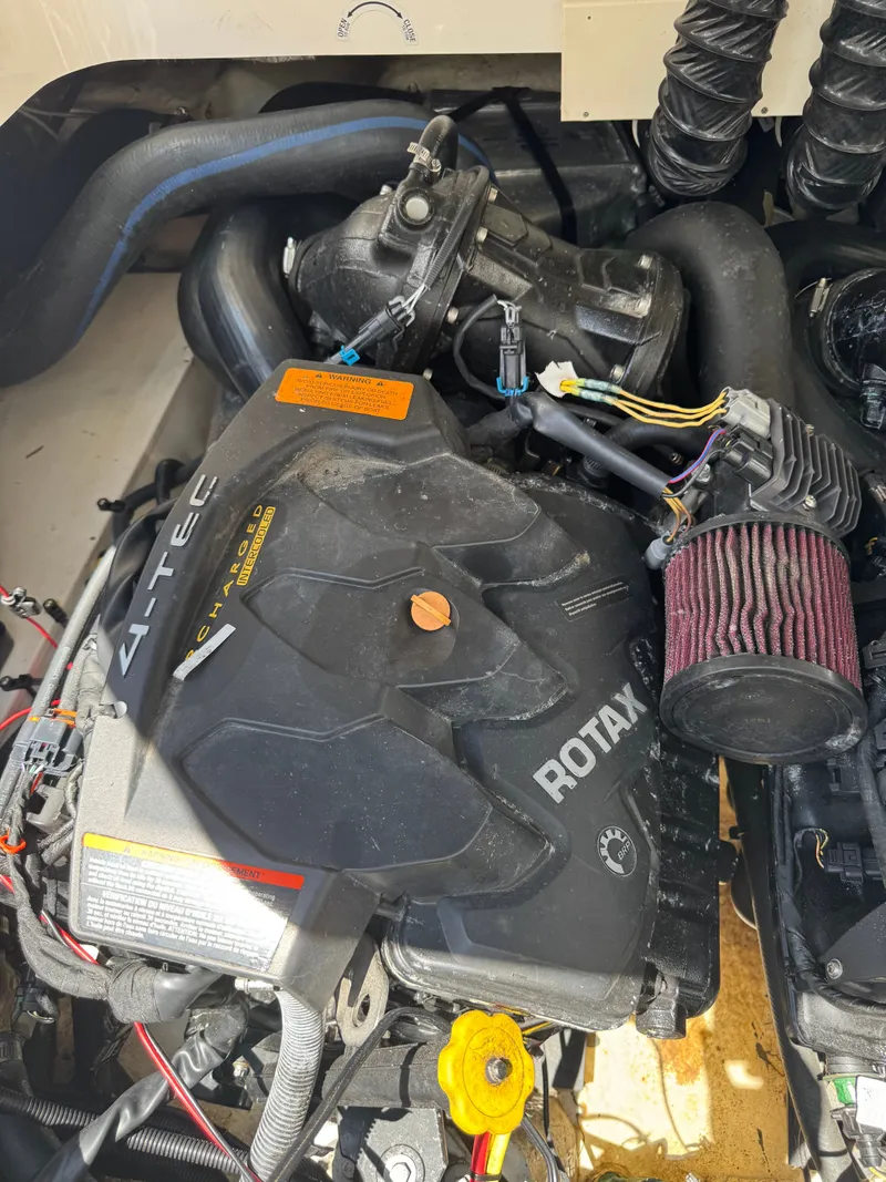 Slide: The Image of Engine compartment of a 2017 Chaparral 243VRX with a Rotax engine. - 41